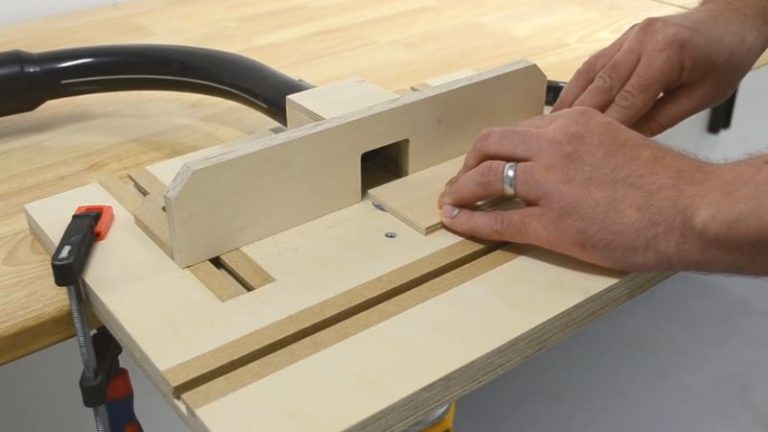 Compact router table setup with fence and router mounted underneath
