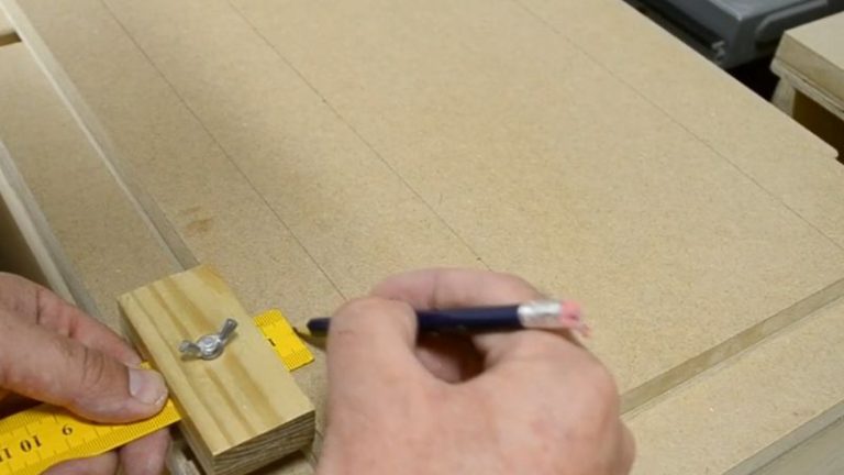 Marking dovetail track layout on MDF jointer sled