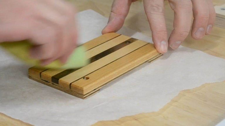 Applying wood oil to the sanding block