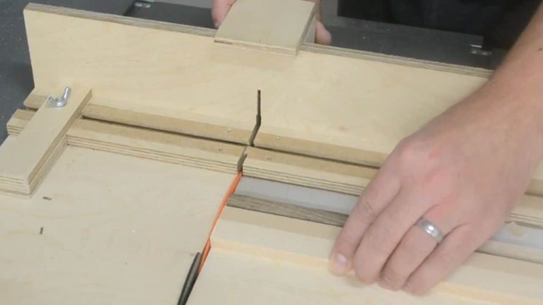 Strips of beech and walnut on a table saw