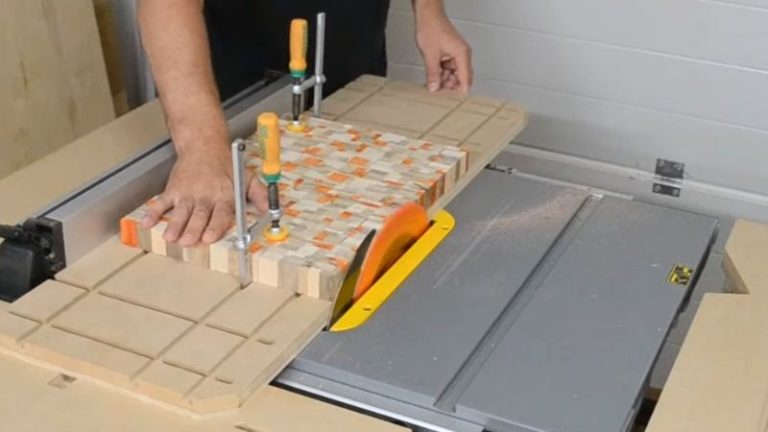 Cutting board clamped to sled for squaring edges