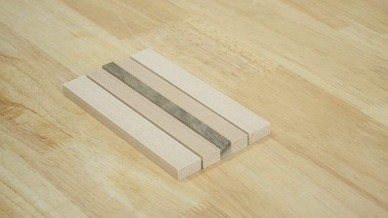 Mixed wood strips arranged in a pattern before glue-up