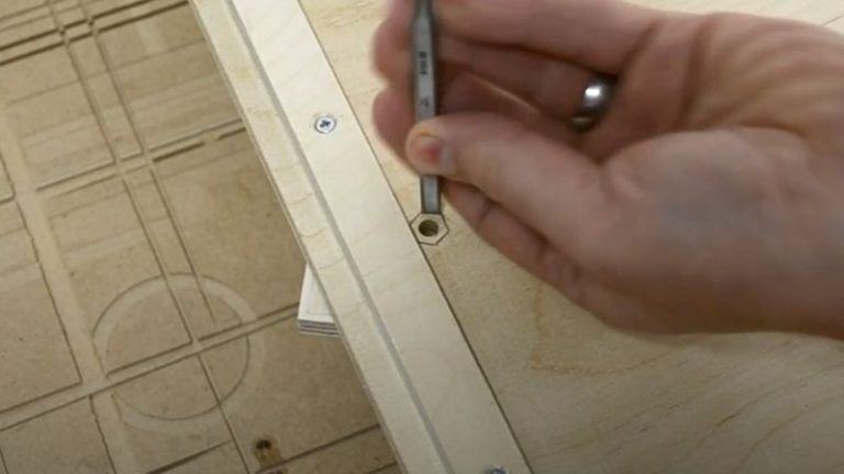 Carving a hexagon recess with a chisel under the sled to fit the bolt head flush