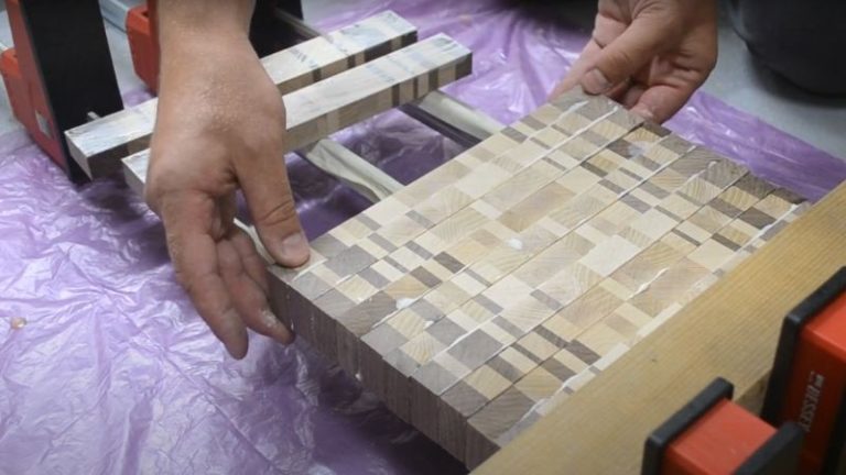 Aligning end grain strips evenly during glue-up to minimize flattening later.