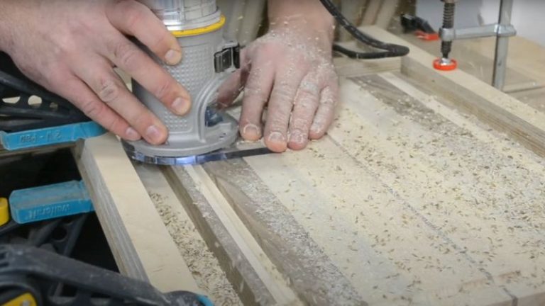 Cutting a juice groove with a trim router and juice groove bit.