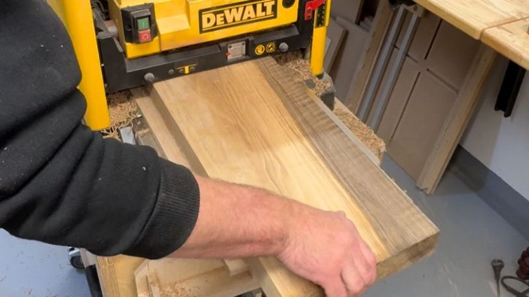 Walnut boards hot-glued to a flat carrier board and passed through the planer.