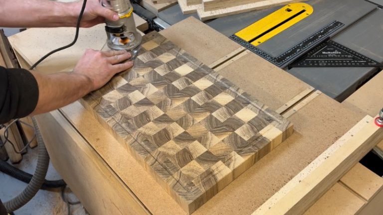 Bevel bit chamfering the cutting board edge, followed by hand sanding with a sanding block.