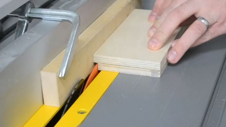 Cutting rabbets on the table saw and cleaning them up for the DIY table saw push block base.