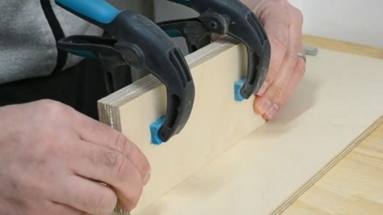 Gluing and screwing together the 12 mm and 9 mm plywood layers to form the push block base frame.