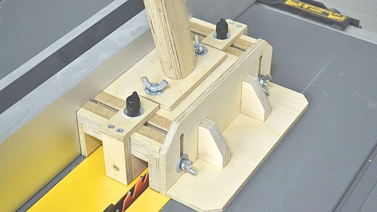 DIY table saw push block with adjustable center leg, side stand, handle, and non-slip rubber base for safe ripping.