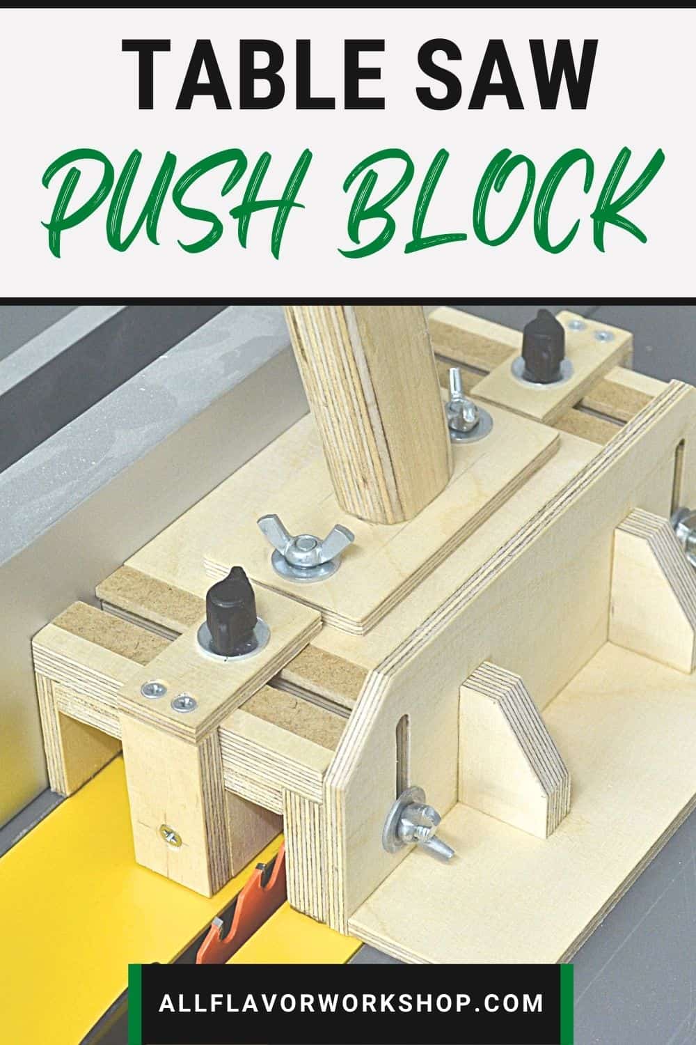 Homemade table saw push block guiding a board along the fence with a grippy rubber base.