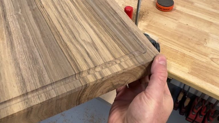 Close-up of a cutting board with beveled edges.