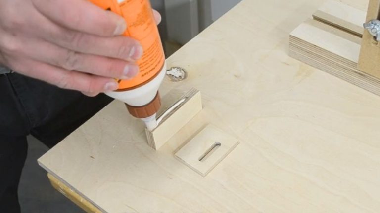 Two plywood pieces cut for the back stopper, one for the T-track base and one for the vertical support.