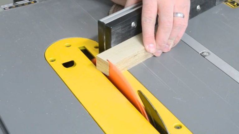 Plywood handle blank with one end cut at a slight angle for a more ergonomic grip on the jig.