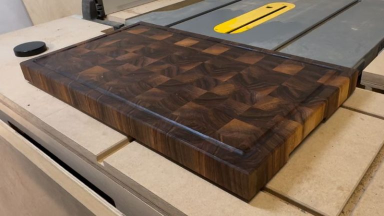 Checking a cutting board with rubber feet for rocking on a countertop and adding a washer under one foot to level it.