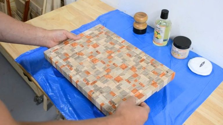 Cutting board before applying Clark’s oil and wax, sanded and dry with muted wood grain.