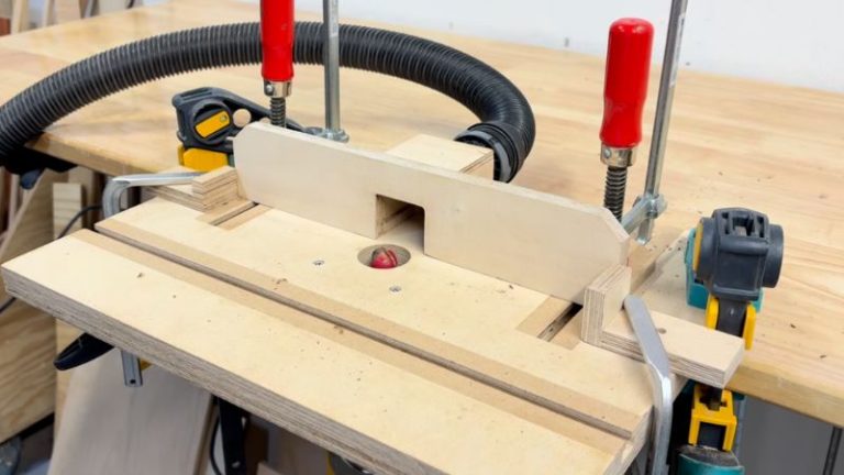 Router table setup with left and right stoppers set to control the length of a side finger groove handle on a cutting board.