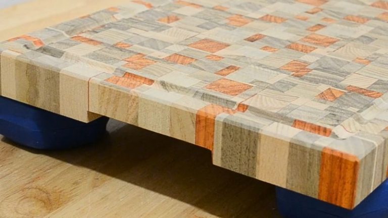 Underside finger grip handle on a cutting board, routed on the lower side for a comfortable lift and clean look.