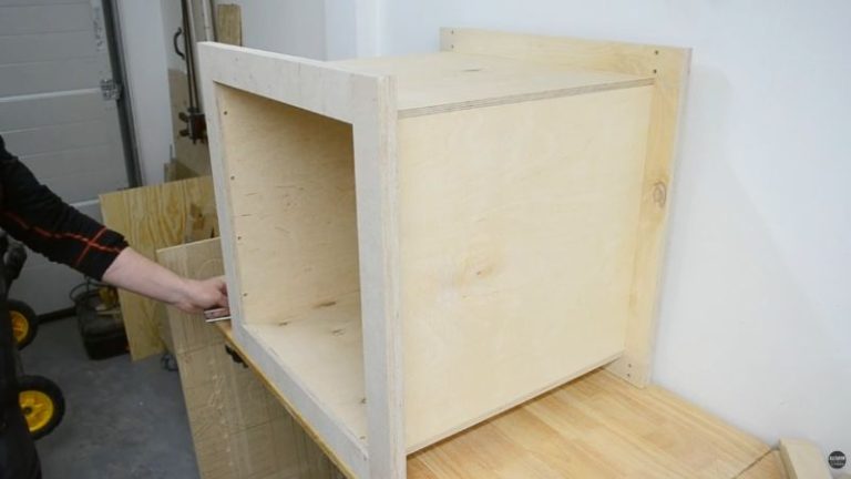 Main plywood cart body assembled with inside panels installed between the support frames.