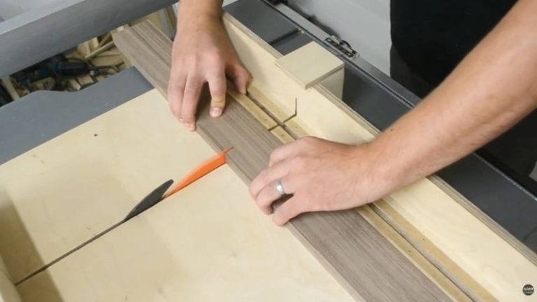 Crosscut sled setup cutting chess board strips to 350 mm length for accurate repeatable cuts.