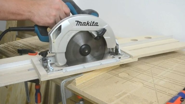 Cutting inner divider parts for a DIY lumber storage cart using a crosscut sled and straight edge guide for accurate sizing.