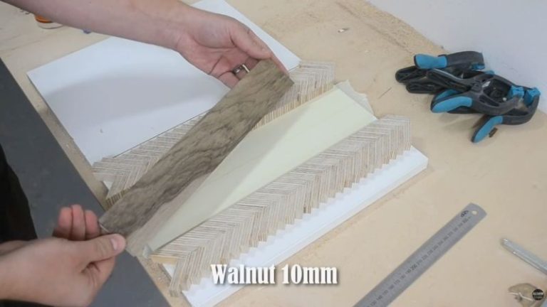 Cutting a walnut handle core piece to size on a table saw for a laminated wooden mallet handle.