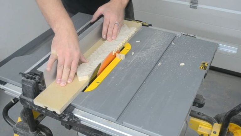 Trimming the plywood pattern panels on a table saw to create two uniform panels for a laminated wooden mallet handle.