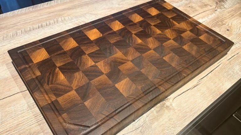 Cleaned and refreshed walnut end grain cutting board after soap, oil, and wax maintenance.