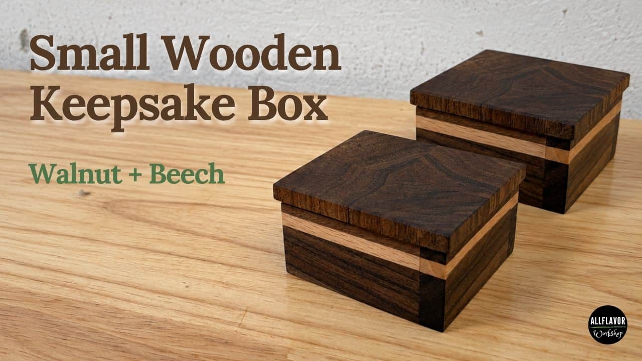 Two small walnut and beech wooden keepsake boxes with fitted lift-off lids.