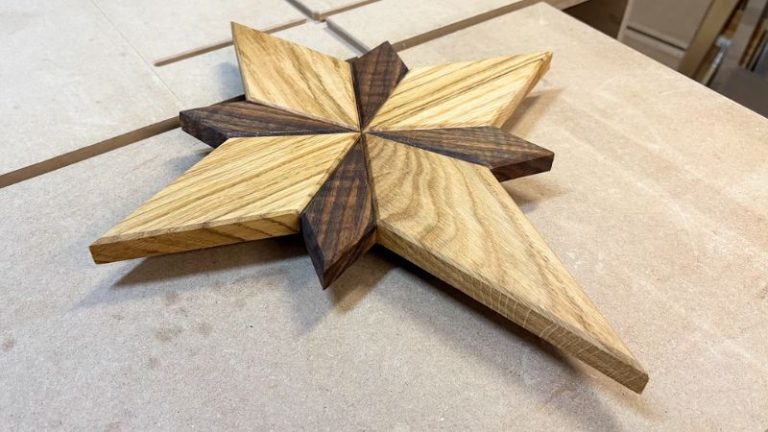 Oak and walnut Bethlehem star after applying wood oil.