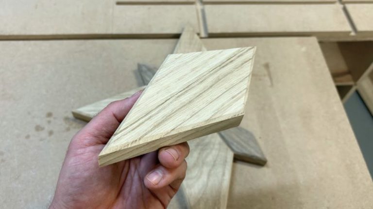 Oak Bethlehem star piece with wood grain running toward the outer point.