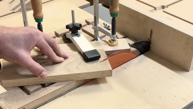 Cutting a 30 degree angle for an oak Bethlehem star point on a table saw sled.