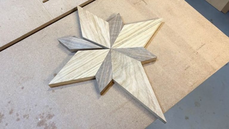 Oak and walnut Bethlehem star pieces dry fitted together before gluing.
