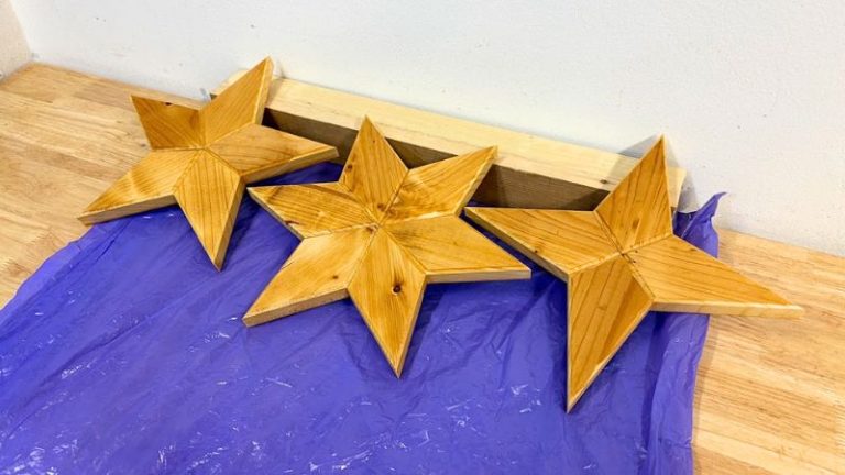 Applying mineral oil finish to a spruce wooden star