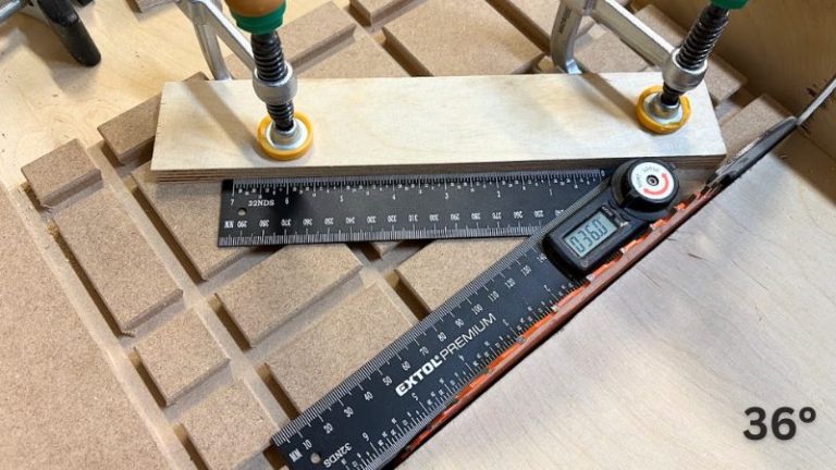 Setting the wooden star cutting angle on a table saw angle jig. 36 degrees.