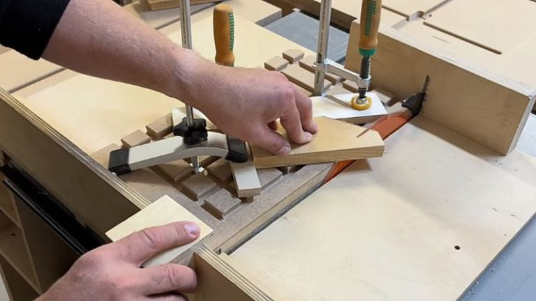 Table saw angle jig setup for making repeatable wooden star pieces.