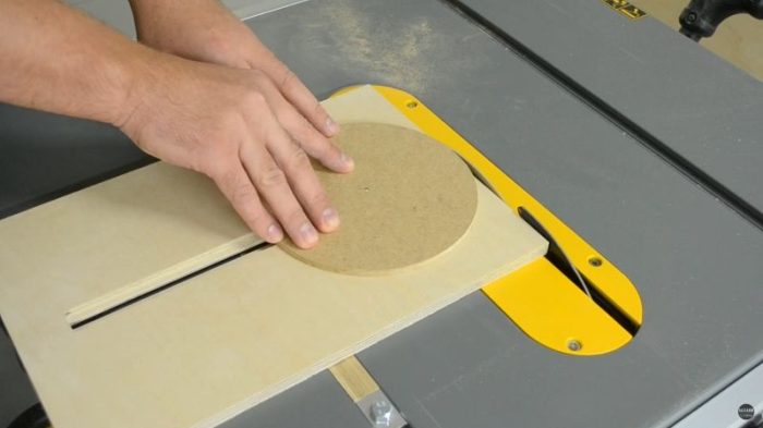 Table saw circle jig with T-track and center pin, designed for small discs