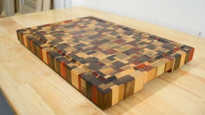 chaotic-end-grain-cutting-board-oiled Oiled chaotic end grain cutting board highlighting the vibrant red, brown, and light wood tones.
