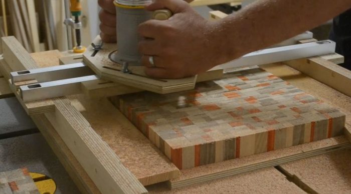 Router used on a flattening jig to level a cutting board