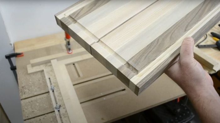 Close-up of a router cutting a rounded corner of a juice groove.